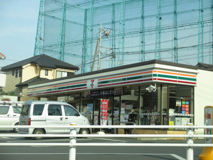 セブンイレブン京王山田駅前店(コンビニ)まで600m フレグランス四季B