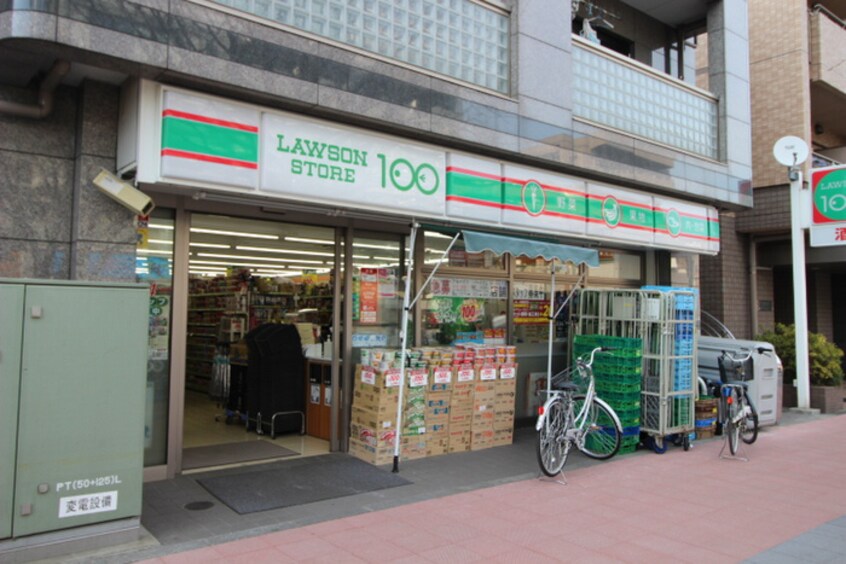 ローソンストア100飛田給駅北口店(コンビニ)まで550m カーサ・ビアンカ