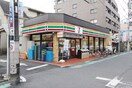 セブン-イレブン世田谷喜多見駅前店(コンビニ)まで250m カルムイン成城西