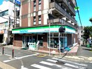 ファミリーマート 佐野寅二安浦店(コンビニ)まで900m ＤＯＭＡＮＩ