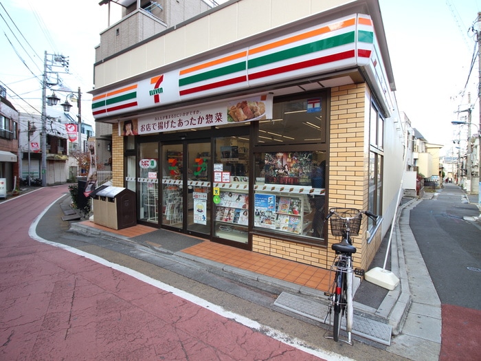セブンイレブン(コンビニ)まで130m ヴェッセル飛鳥山