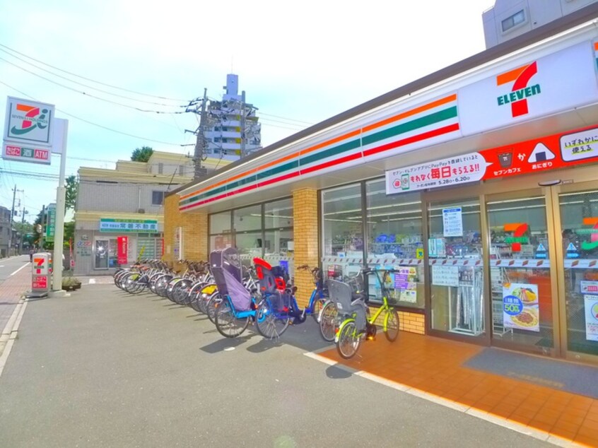 セブンイレブン(コンビニ)まで70m ハイム石橋