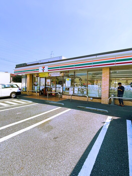 セブンイレブン(コンビニ)まで487m ブルーローズ