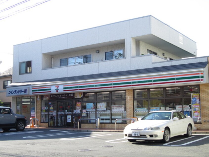 セブンイレブン川崎田島町店(コンビニ)まで55m フラット佐藤
