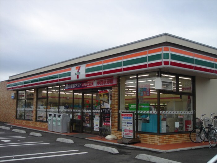 セブンイレブン(コンビニ)まで450m ホワイトハイランドＢ