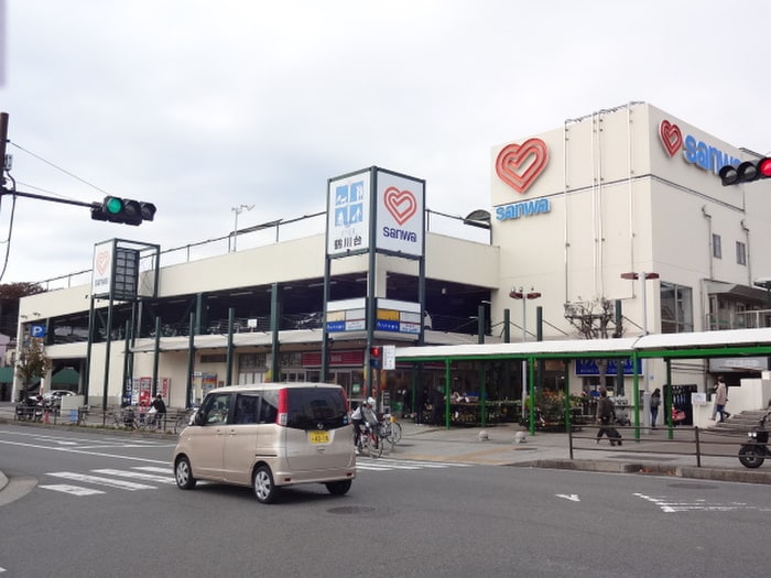 スーパー三和 鶴川店(スーパー)まで1100m マンションワイズ１