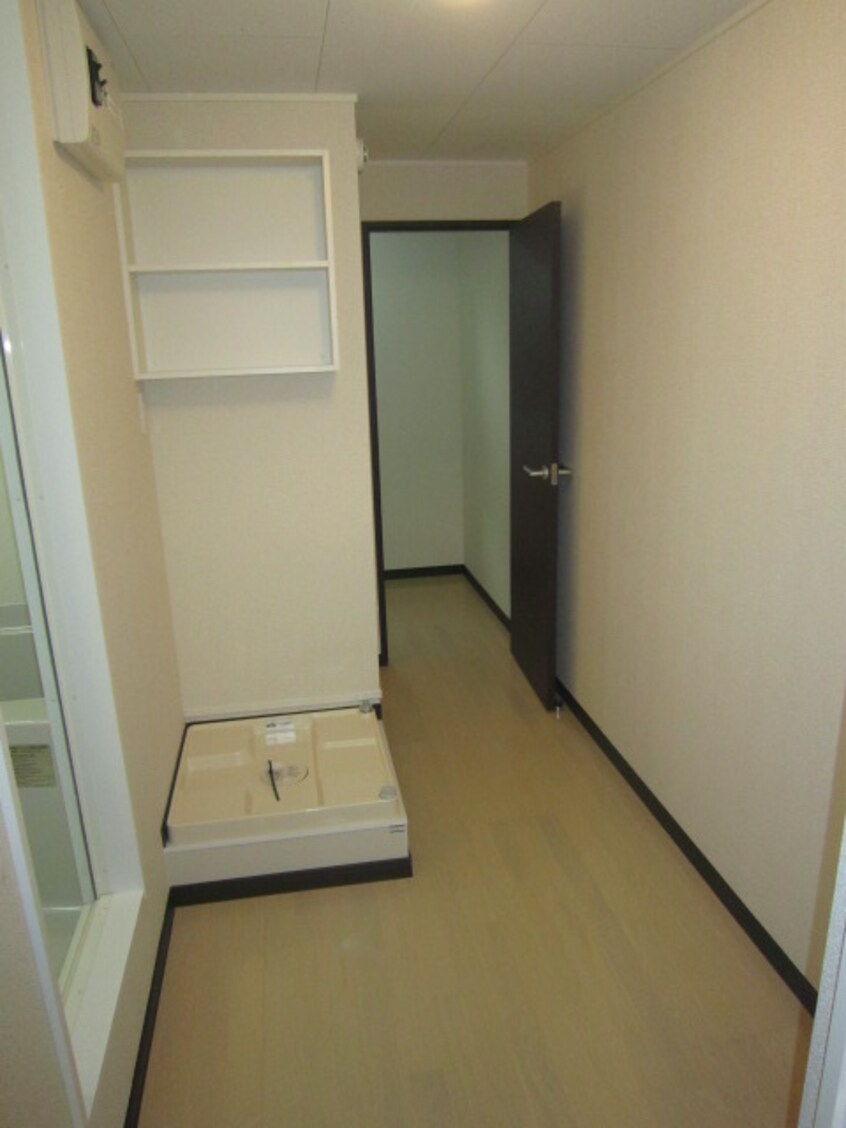 洗濯機置場 カサ・ボニータ下小松