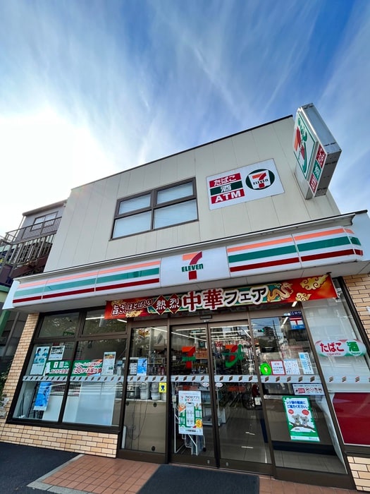 セブンイレブン(コンビニ)まで350m ロ－ズコ－ト宝町