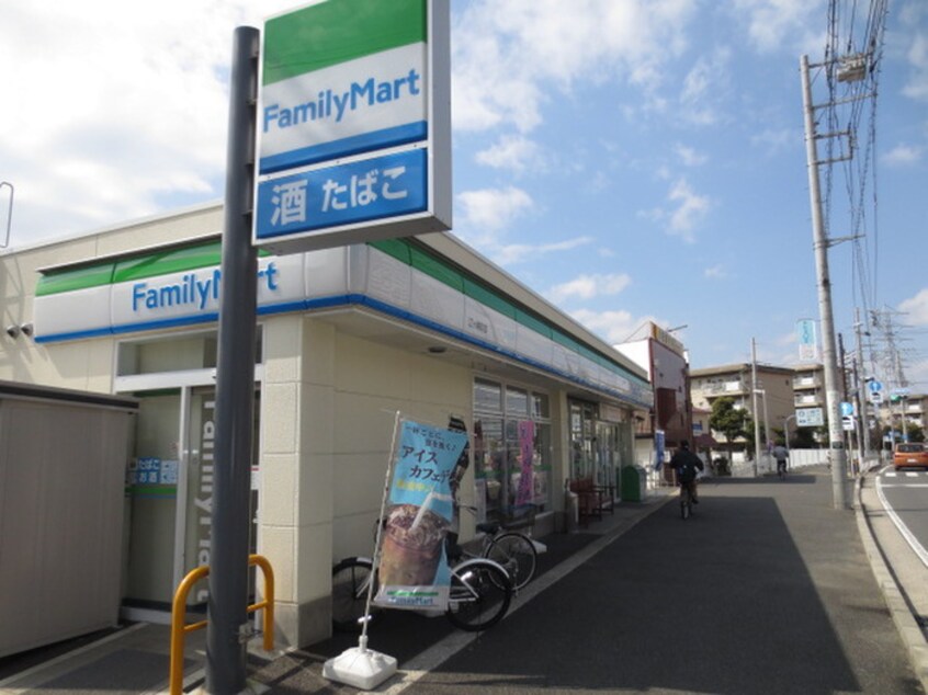 ファミリーマート江ヶ崎店(コンビニ)まで70m 第一西小倉荘