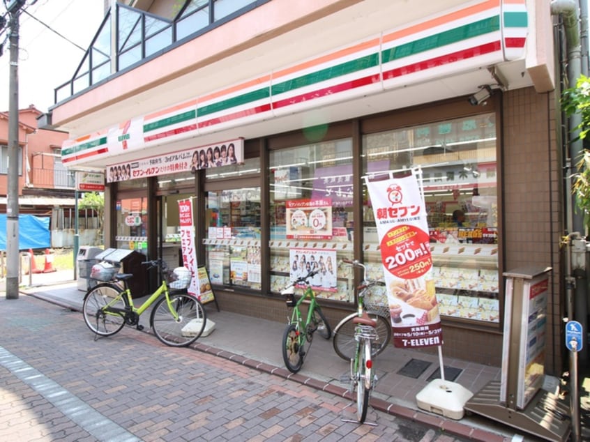 セブンイレブン(コンビニ)まで300m ハイツ吉田