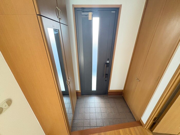 玄関 エストゥペンダ希望が丘