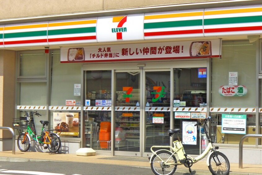 セブンイレブン(コンビニ)まで100m 新田町小川マンション