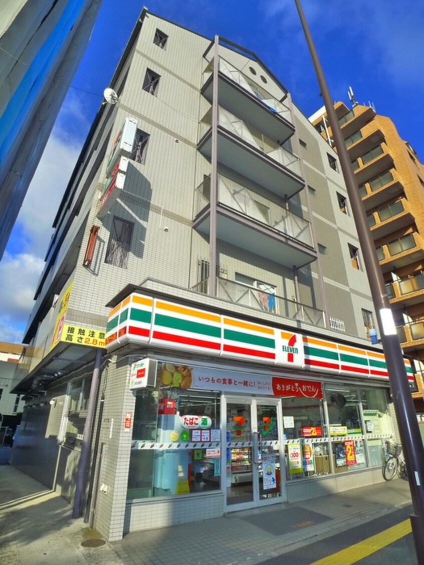 セブン-イレブン 千住桜木店(コンビニ)まで600m リバービレッジ