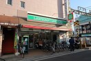 ローソンストア100　西調布店(コンビニ)まで305m グリーンヒル