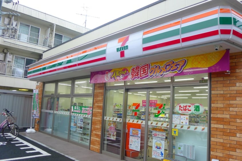 セブンイレブン(コンビニ)まで530m 綾瀬ビル