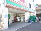 100円ローソン(コンビニ)まで445m 田村荘