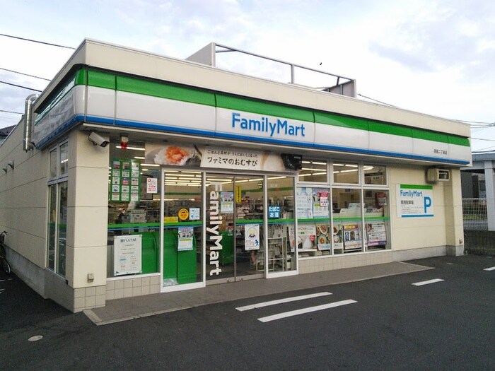 ファミリーマート羽田二丁目店(コンビニ)まで140m メゾン向山