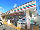 セブンイレブン(コンビニ)まで504m ハーモニーテラス梅田ⅩⅢ