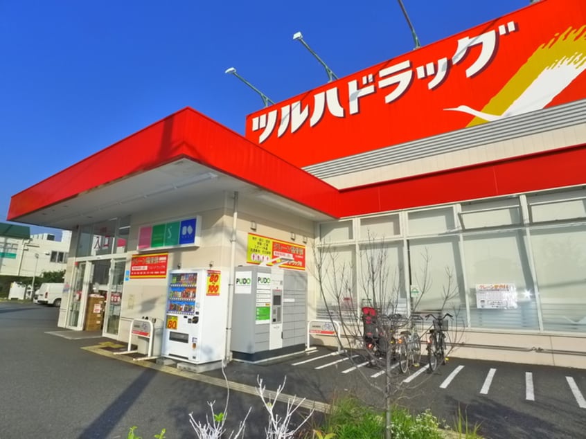 ツルハドラッグ(ドラッグストア)まで385m サニーコーポラス
