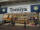 株式会社トミヤ 鶴見店(スーパー)まで386m カーサマツダ