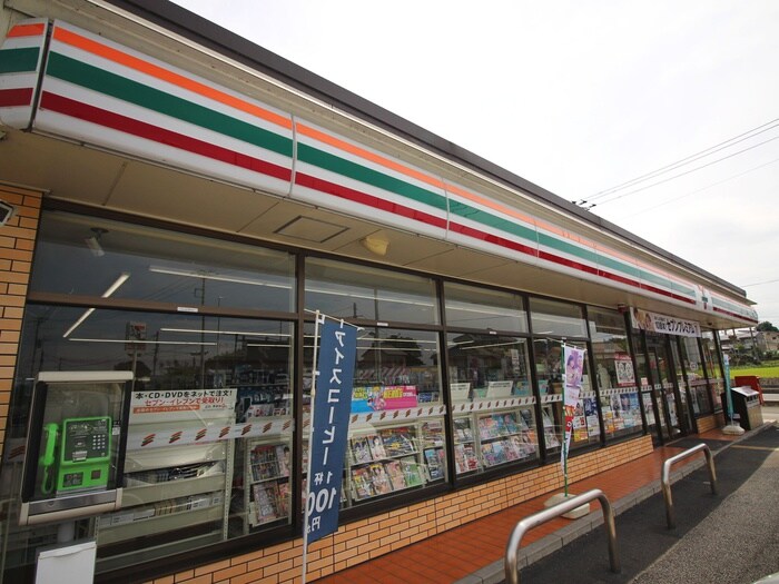 セブンイレブン日高旭ヶ丘店(コンビニ)まで1000m ブランドール