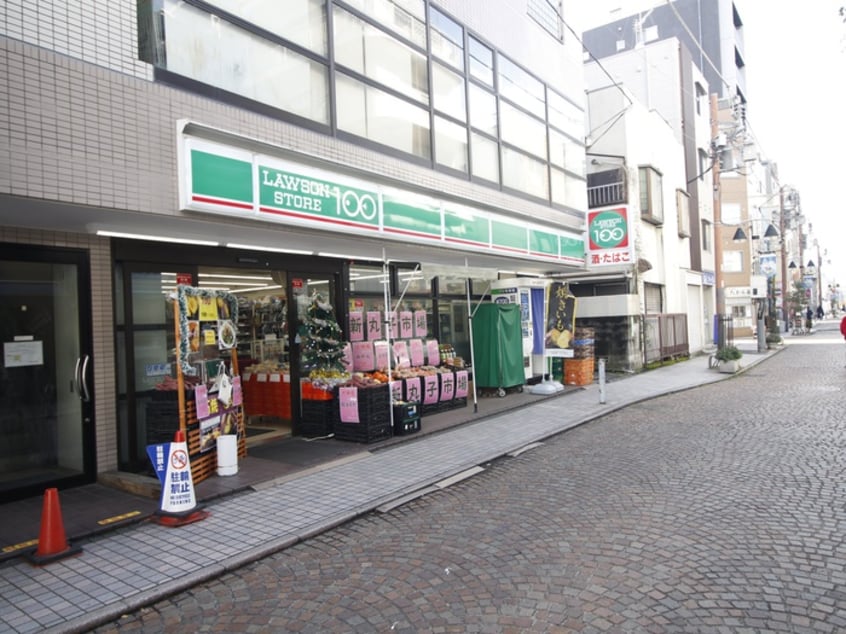 ローソンストア100(コンビニ)まで30m ハイツ佐藤