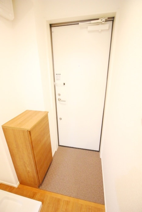 玄関 カインドネス八王子中央C棟