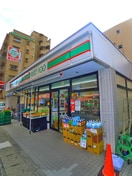 ローソンストア100(100均)まで710m キャメル松戸岩瀬