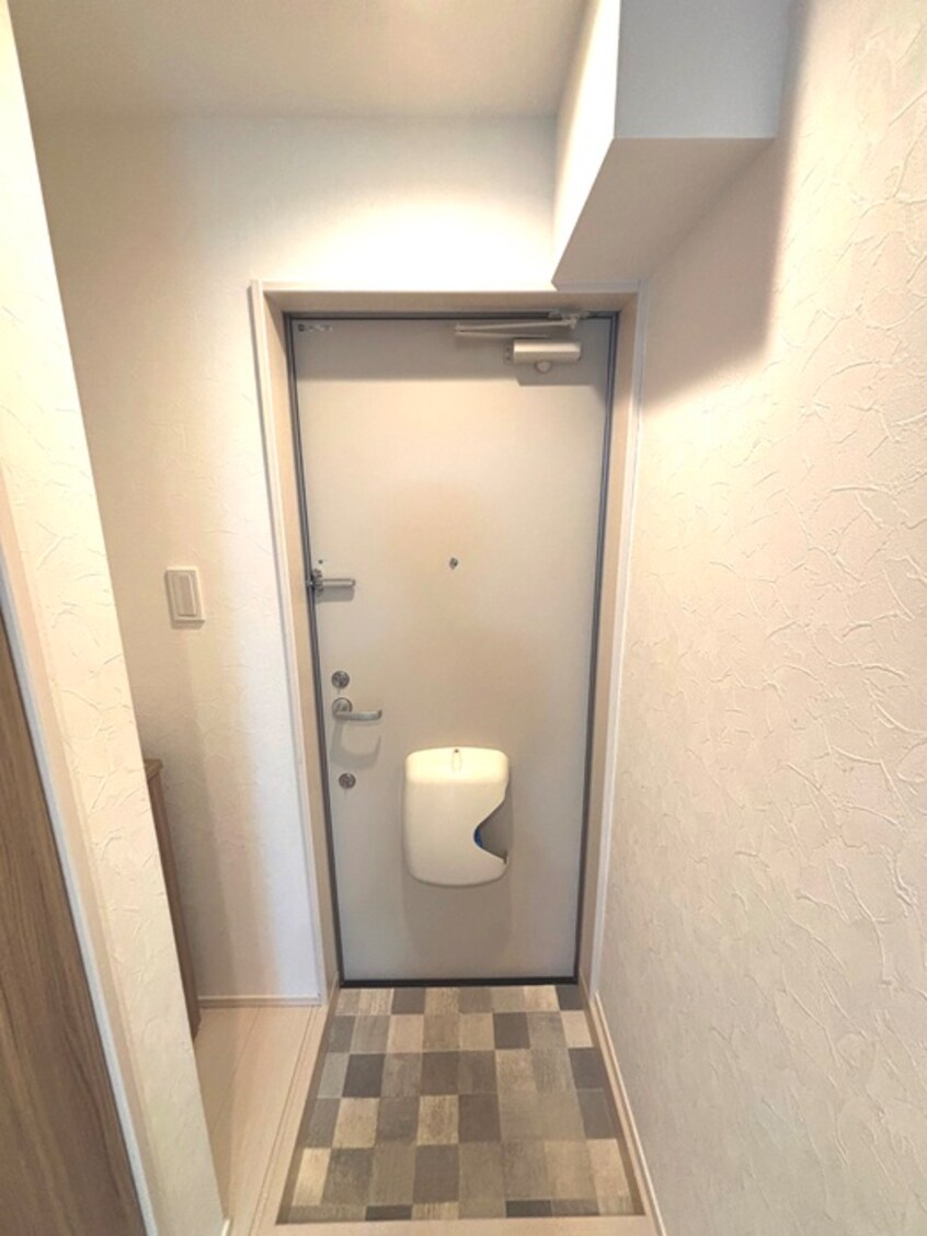 玄関 アザーレ・バモス生田