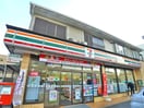 セブンイレブン(コンビニ)まで140m ビレッジ都町Ⅱ　E棟