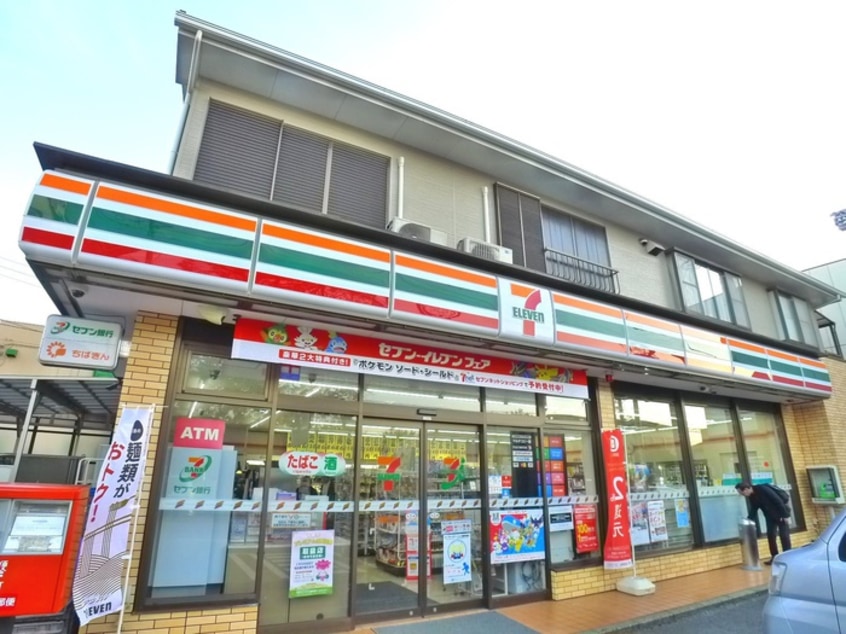 セブンイレブン(コンビニ)まで140m ビレッジ都町Ⅱ　E棟
