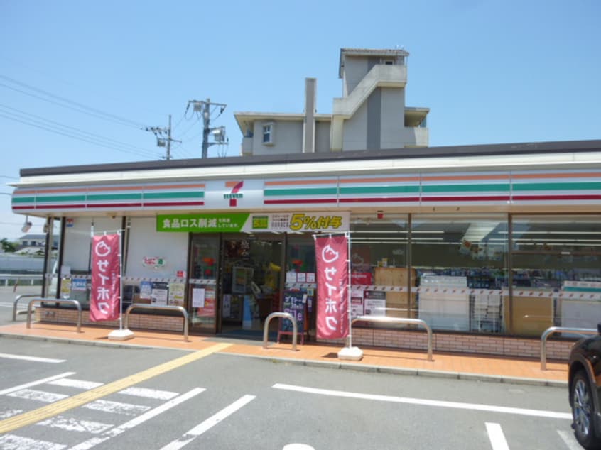 セブンイレブン入間市野田店(コンビニ)まで701m スナタハイツアライ