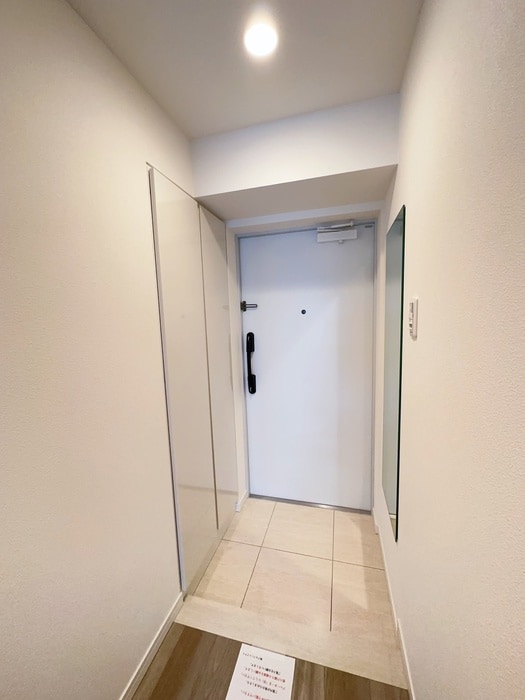 玄関 ｱｲﾙﾌﾟﾚﾐｱﾑ東京府中（202）