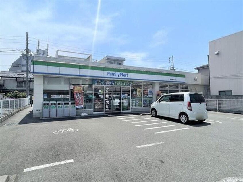 ファミリーマート　東青梅駅北口店(コンビニ)まで163m モンテベーネ