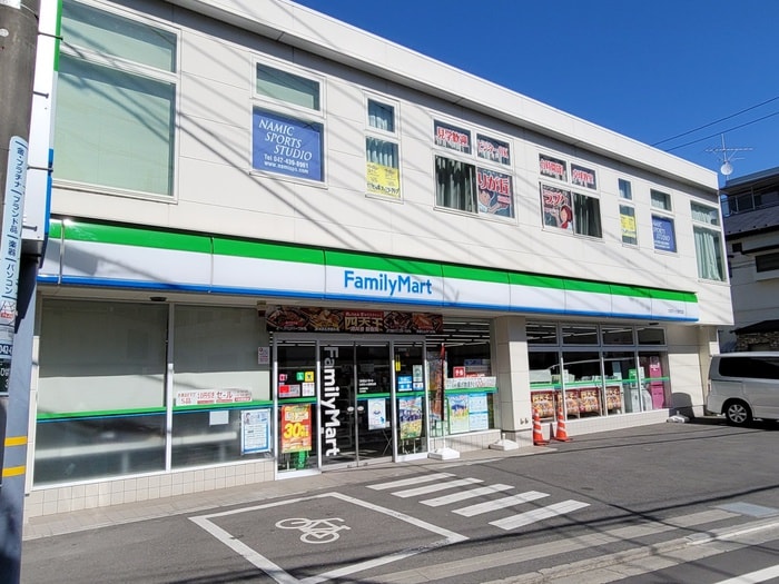 ファミリーマート　ひばりが丘駅北店(コンビニ)まで91m マンションスイング