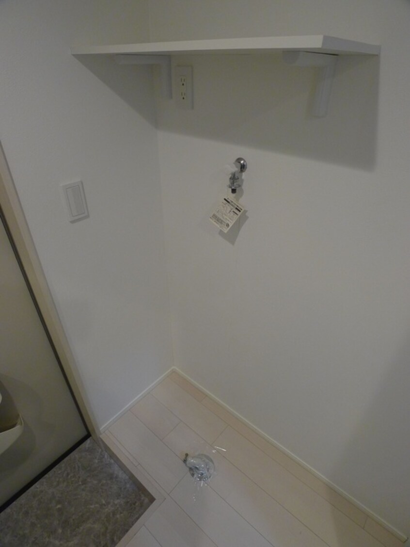 洗濯機置場 ハ－モニ－テラス綾瀬Ⅲ