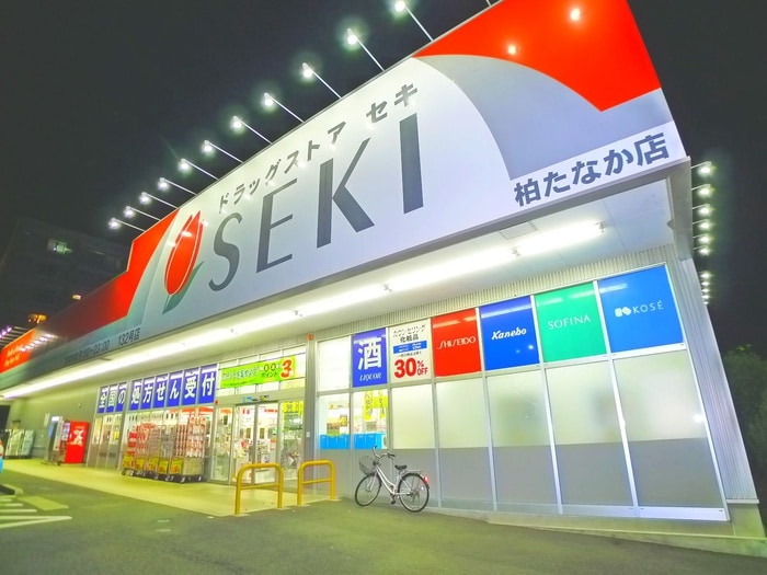 ドラッグストアセキ(ドラッグストア)まで300m ドエルコート