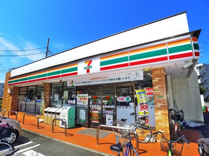 セブンイレブン(コンビニ)まで400m 伊興１丁目店舗付き住宅