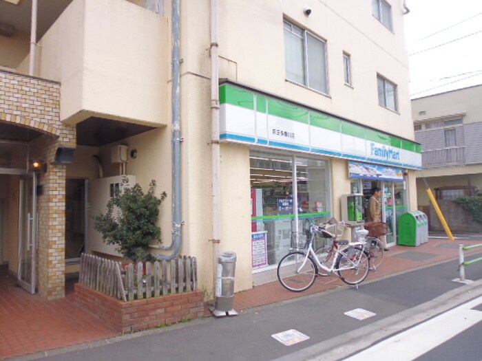 ファミリーマート　京王多摩川駅店(コンビニ)まで52m メゾントミタ