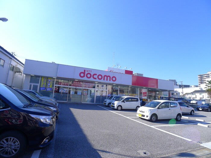 ドコモショップ(ディスカウントショップ)まで360m 櫻井ビル