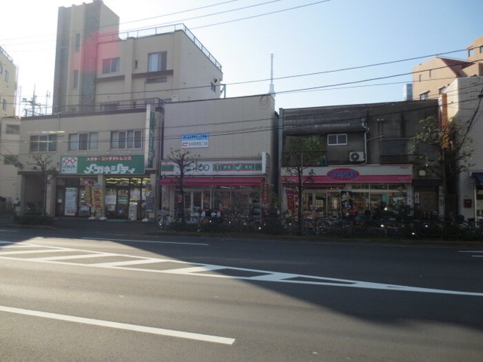 ローソンストア100(コンビニ)まで293m 京島一丁目貸家