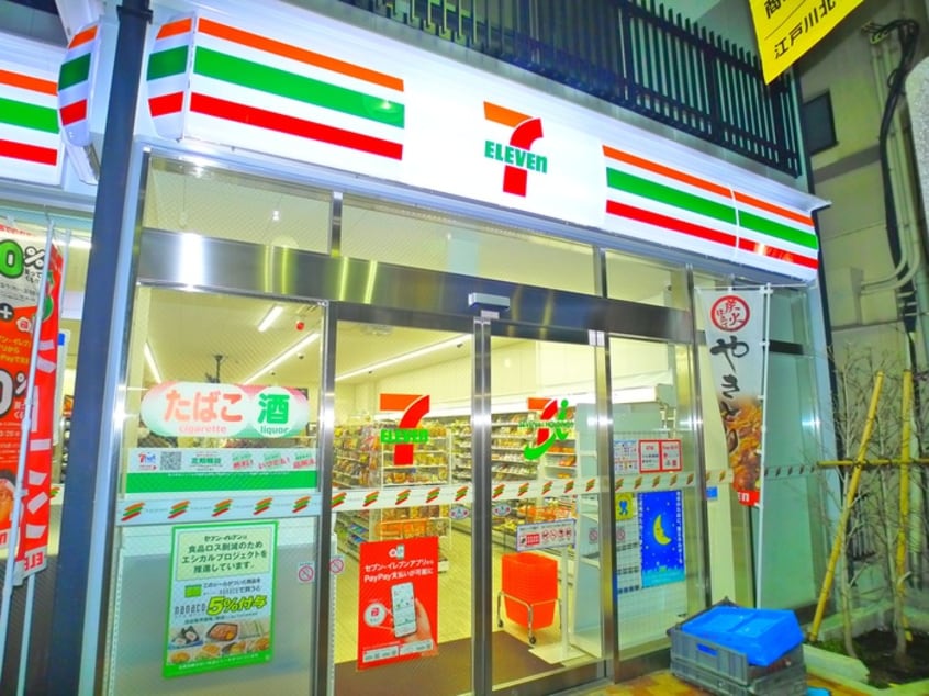 セブンイレブン(コンビニ)まで102m 鈴木マンション