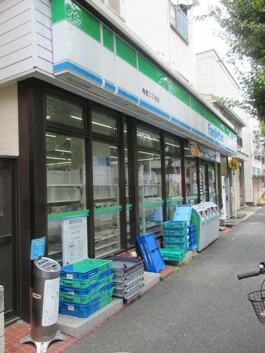 ファミリーマート 梅里二丁目店(コンビニ)まで810m ウェルスクエアイズム高円寺