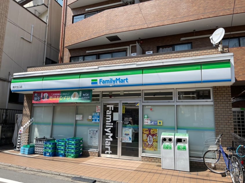 ファミリーマート　柳沢北口店(コンビニ)まで278m メゾン本町