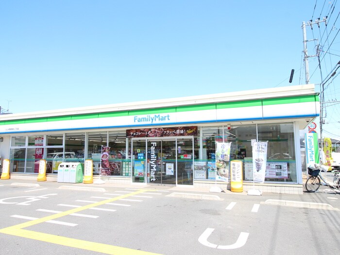 ファミリーマート駒林二丁目店(コンビニ)まで300m ガ－デンベル