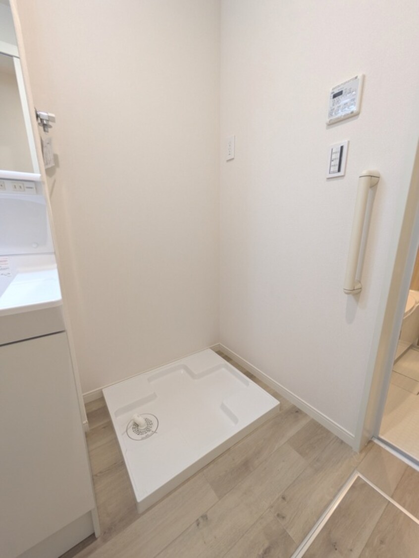 洗濯機置場 カーサクラーノ