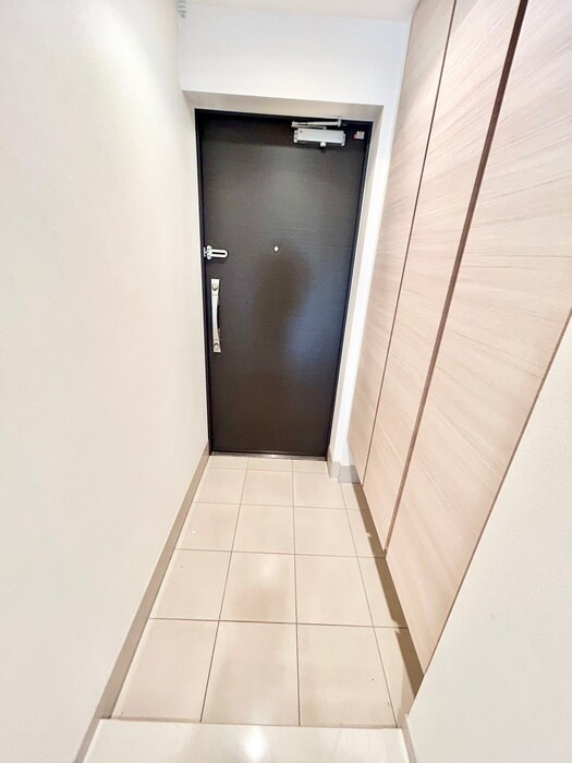 玄関 プレシス多摩永山レヴィエ(404)