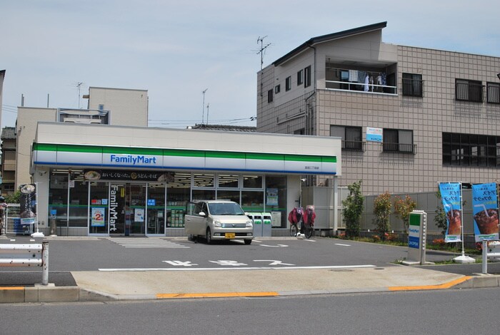 ファミリーマート皿沼2丁目店(コンビニ)まで127m アネックス２９Ａ