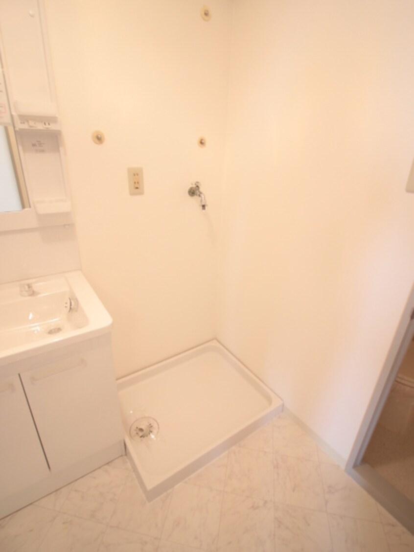 洗濯機置場 カーサ・ベイジュ