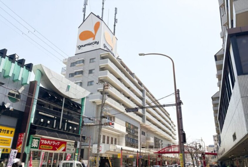 グルメシティ(スーパー)まで275m 仮）ﾌｧｰｽﾄﾌｨｵｰﾚ神戸ﾋﾟｱﾁｪｰﾚ